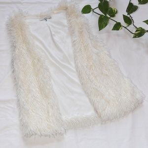 Soft fluffy white vest